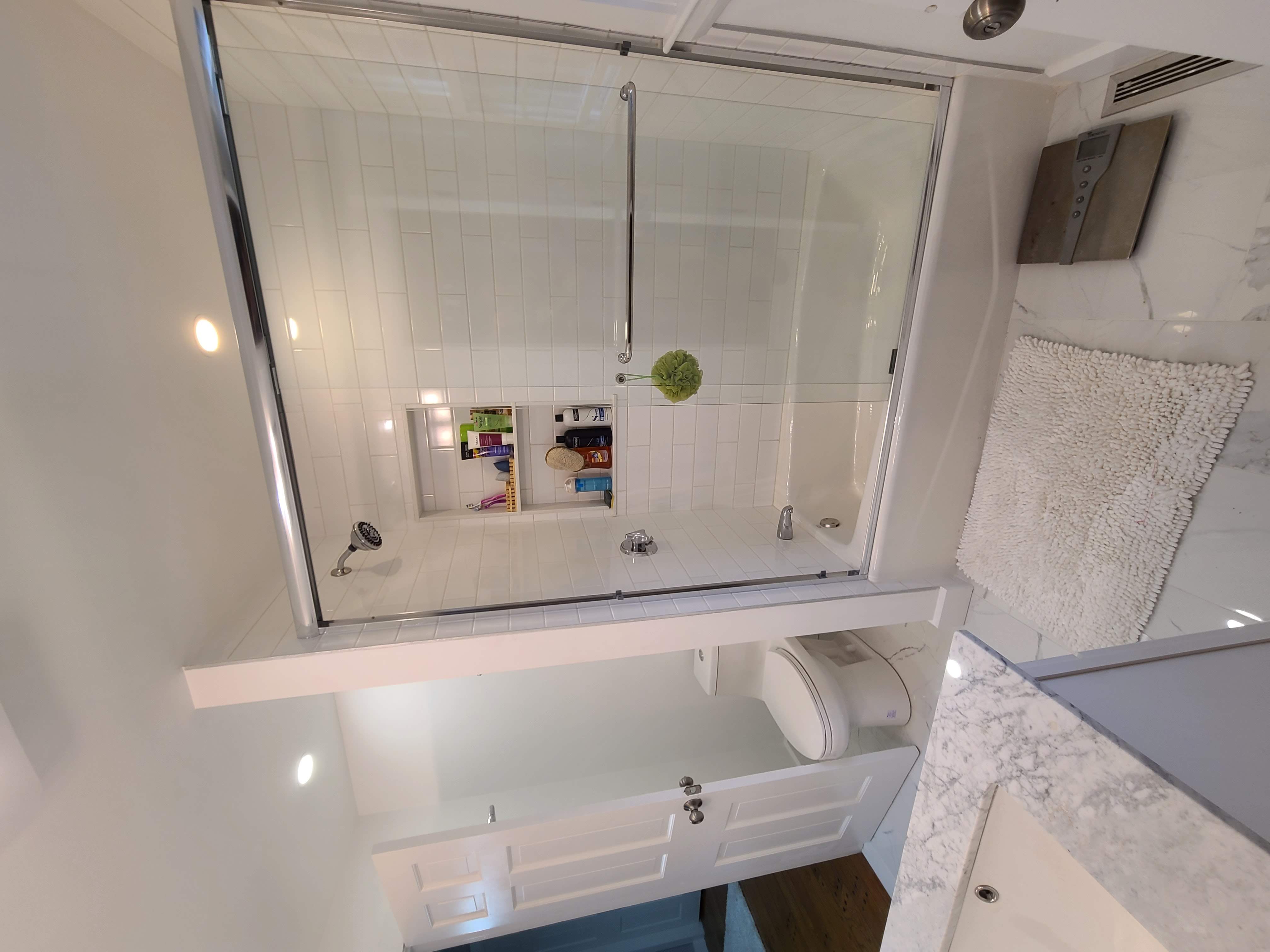 Walk-in shower installation with frameless glass Greater Boston